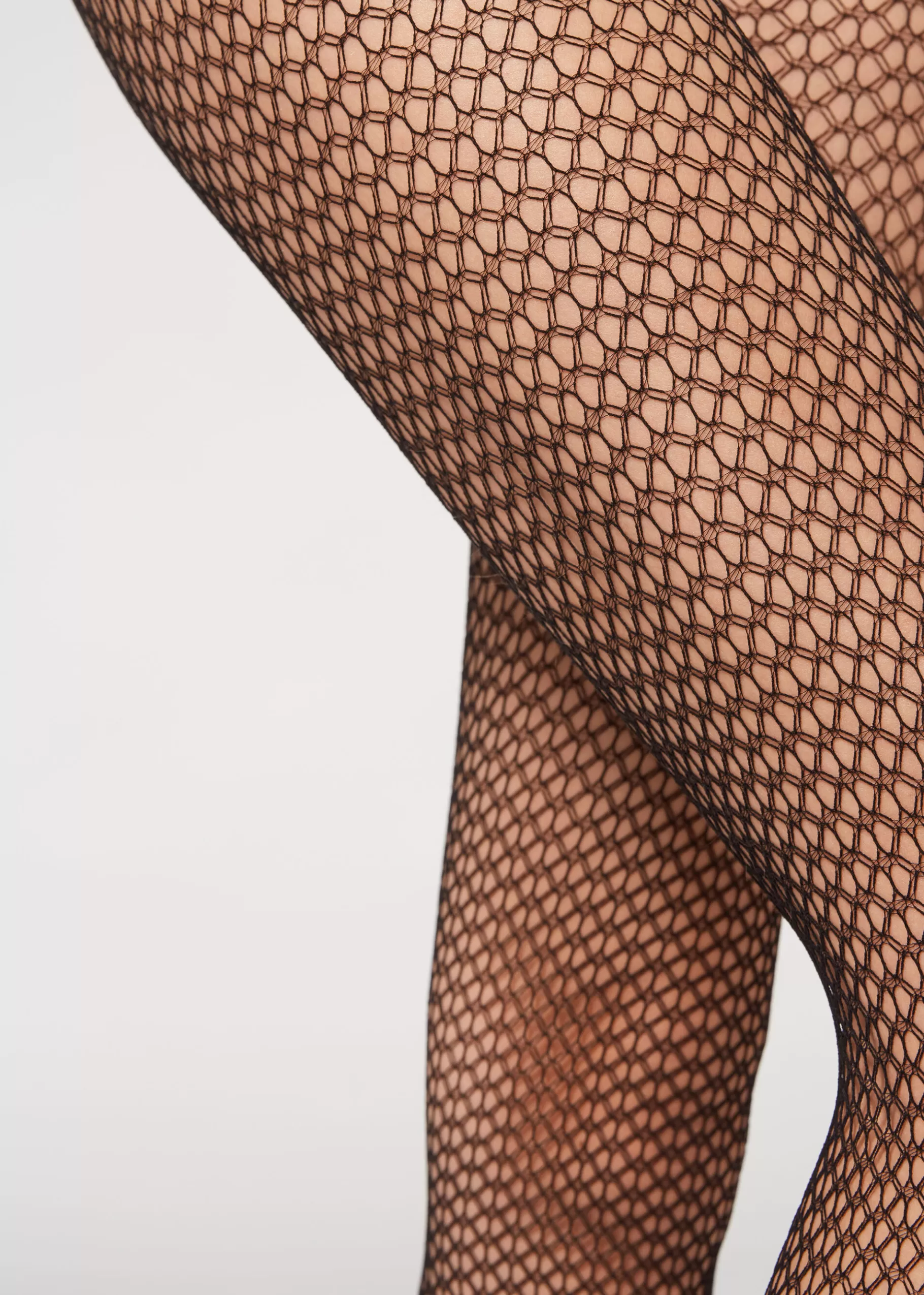Shop Geometric-Patterned Fishnet Tights Women Patterned Tights